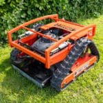 a remote control lawn mower on grass