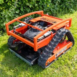 a remote control lawn mower on grass