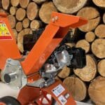 upper exit chute for mulcher, mulcher and wood chipper